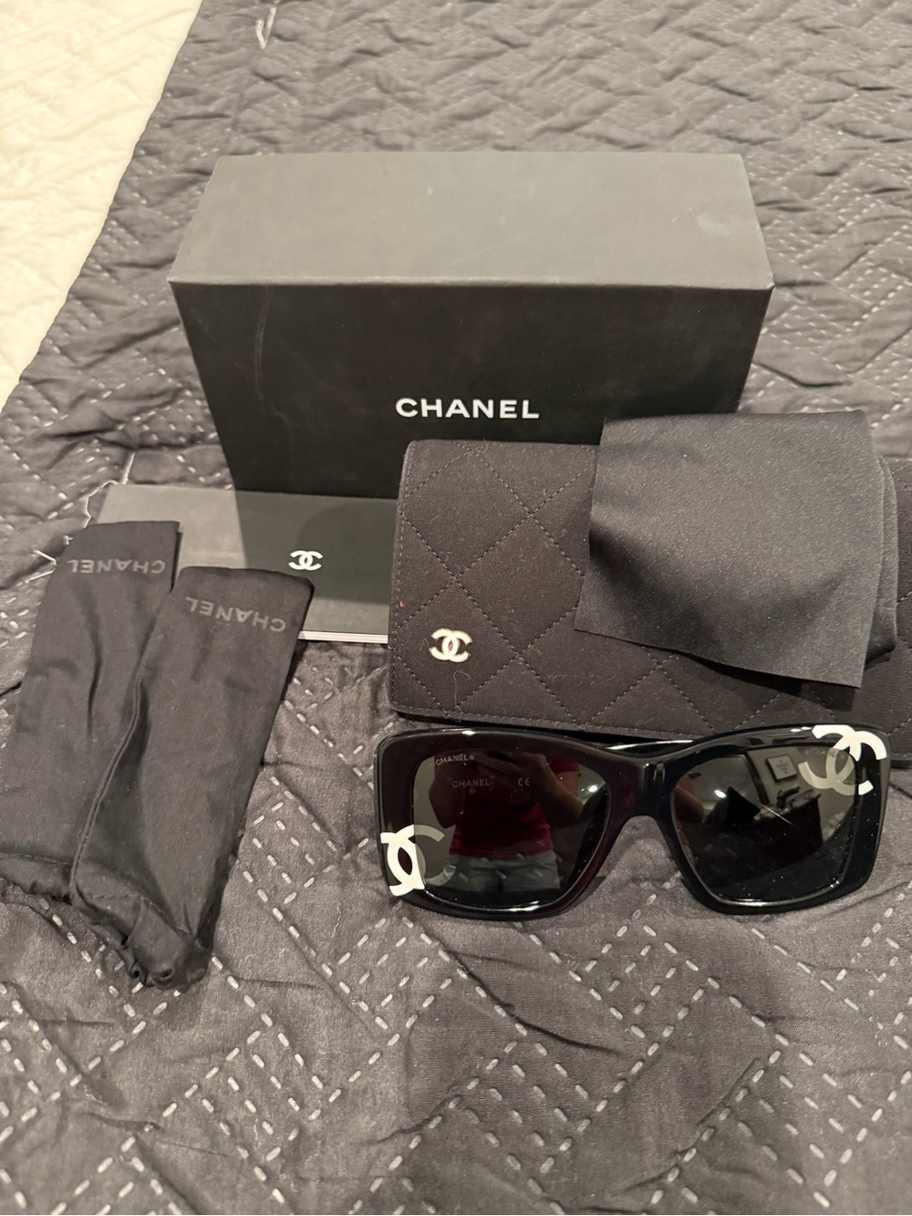 CHANEL Black Sunglasses with Gold Logo